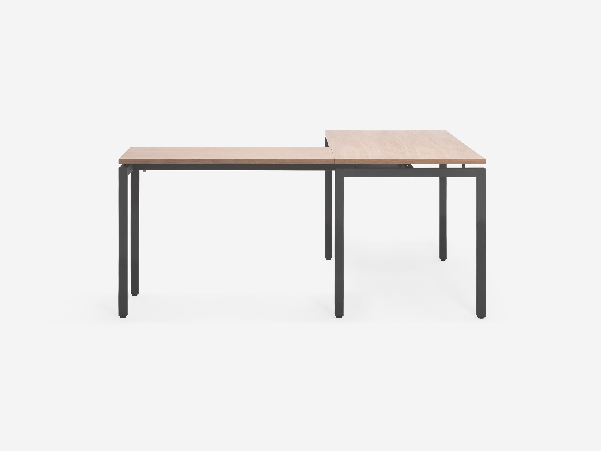 Side view of the Novah custom right hand l shaped desk with walnut top and black base